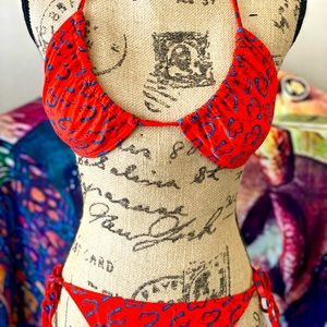 Red bikini with dolphins